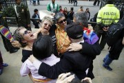 LGBT rights activists celebrate a Constitutional Court decision in favor of same-sex marriage, Bogota, Colombia, April 7, 2016 (AP photo by Fernando Vergara).