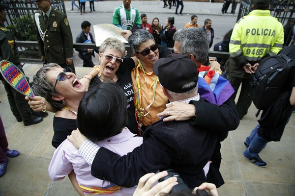 LGBT rights activists celebrate a Constitutional Court decision in favor of same-sex marriage, Bogota, Colombia, April 7, 2016 (AP photo by Fernando Vergara).