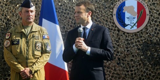 French President Emmanuel Macron speaks to French troops at al-Udeid Air Base in Qatar, Dec. 7, 2017 (AP photo by Fay Abuelgasim).