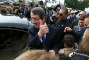 Cyprus’ president, Nicos Anastasiades, gestures to supporters after voting in the recent election, Limassol, Cyprus, Feb. 4, 2018 (AP photo by Petros Karadjias).