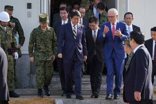Australian Prime Minister Malcolm Turnbull and his Japanese counterpart, Shinzo Abe, view military equipment at a site east of Tokyo, Jan. 18, 2018 (AP photo by Eugene Hoshiko).