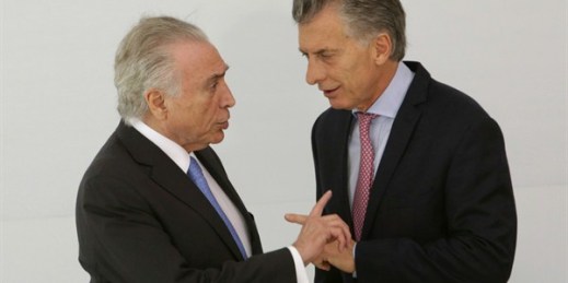 Brazilian President Michel Temer talks with Argentine President Mauricio Macri at the Mercosur and Associated States Summit of Heads of State, Brasilia, Brazil, Dec. 21, 2017 (AP photo by Eraldo Peres).