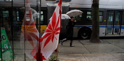 A maple leaf has been replaced with a cannabis leaf on a Canadian flag outsie the Cannabis Culture Headquarters in Vancouver, British Columbia, Feb. 23, 2010 (AP photo by Jae C. Hong).