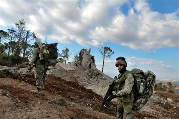 Turkish troops secure the Bursayah hill, which separates the Kurdish-held enclave of Afrin from the Turkey-controlled town of Azaz, Syria, Jan. 28, 2018 (AP photo).