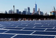 A rooftop is covered with solar panels at the Brooklyn Navy Yard, New York, Feb. 14, 2017 (AP photo by Mark Lennihan).