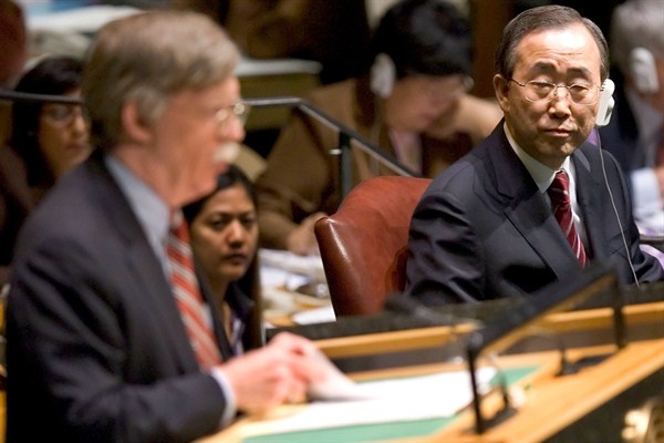 Ban Ki-moon listens as John Bolton, then the U.S. ambassador to the U.N., speaks after Ban’s nomination to become secretary-general was approved, New York, Oct. 13, 2006 (AP photo by Stephen Chernin).