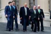 President Donald Trump and other U.S. leaders walk down the steps of the Capitol building after a luncheon with Irish Prime Minister Leo Varadkar, second from right, Washington, March 15, 2018 (AP photo by Evan Vucci).
