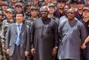 President Ernest Bai Koroma, center, is flanked by then-Vice President Samuel Sam-Sumana and Chinese Ambassador Zhao Yanbo, at the opening of the China Friendship Hospital, Freetown, Sierra Leone, Sept. 25, 2014 (AP photo by Michael Duff).