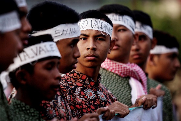 Muslim students take part in a rally against Valentine’s Day, saying it violates Islamic teachings, Banda Aceh, Indonesia, Feb. 14, 2018 (AP photo by Heri Juanda).