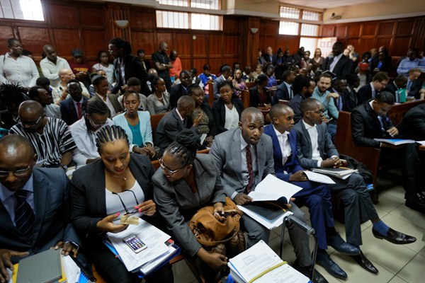 People fill the courtroom as the High Court in Kenya begins hearing arguments in a case challenging parts of the penal code seen as targeting LGBT communities, Nairobi, Kenya, Feb. 22, 2018 (AP photo by Ben Curtis).