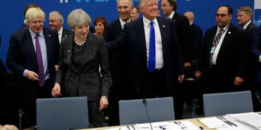 U.S. President Donald Trump and British Prime Minister Theresa May at a working dinner during a NATO summit, Brussels, May 25, 2017 (AP photo by Matt Dunham).