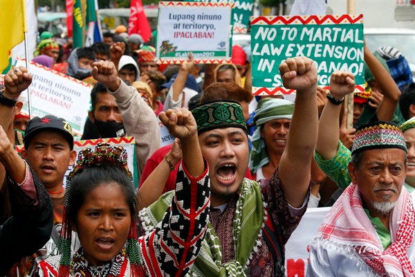 Muslims from Marawi and other Filipinos march to protest the city’s siege and the martial law imposed by President Rodrigo Duterte in the southern Mindanao region, Manila, Aug. 31, 2017 (AP photo by Bullit Marquez).