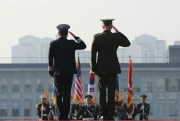 Gen. Joseph Dunford, right, chairman of the U.S. Joint Chiefs of Staff, and Gen. Jeong Kyeong-doo, his South Korean counterpart, salute during an honor guard ceremony, Seoul, South Korea, Oct. 27, 2017 (AP photo by Lee Jin-man).