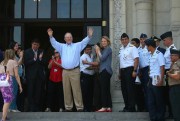 Peru’s then-President Pedro Pablo Kuczynski waves to government workers and supporters outside the House of Pizarro palace and presidential residence one day after offering his resignation, Lima, March 22, 2018 (Peruvian presidential press office).