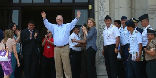 Peru’s then-President Pedro Pablo Kuczynski waves to government workers and supporters outside the House of Pizarro palace and presidential residence one day after offering his resignation, Lima, March 22, 2018 (Peruvian presidential press office).