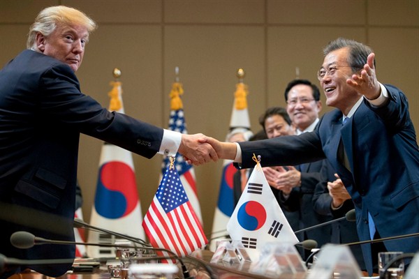 U.S. President Donald Trump and South Korean President Moon Jae-in shake hands during a bilateral meeting at the Blue House in Seoul, South Korea, Nov. 7, 2017 (AP photo by Andrew Harnik).
