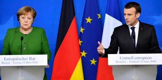 French President Emmanuel Macron and German Chancellor Angela Merkel participate in a press conference at the conclusion of an EU summit in Brussels,  March 23, 2018 (AP photo by Geert Vanden Wijngaert).
