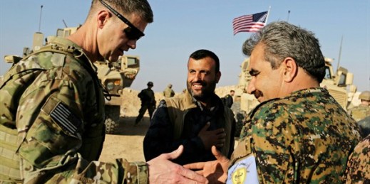 U.S. Army Maj. Gen. Jamie Jarrard thanks Manbij Military Council commander Muhammed Abu Adeel during a visit to a small outpost near the town of Manbij, Syria, Feb. 7, 2018 (AP photo by Susannah George).