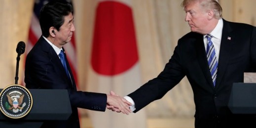 Japanese Prime Minister Shinzo Abe and U.S. President Donald Trump shake hands during a news conference at Mar-a-Lago, Palm Beach, Fla., April 18, 2018 (AP photo by Lynn Sladky).