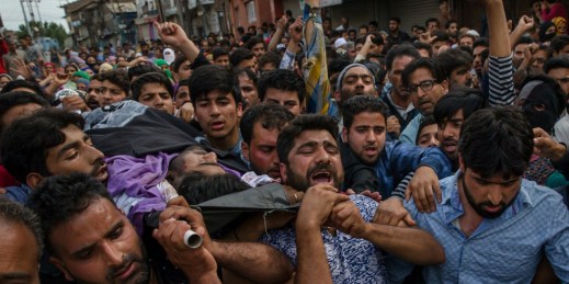 Kashmiri Muslims carry the body of Adil Ahmad, a civilian who was run over and killed by a security vehicle, during his funeral procession, Srinagar, Kashmir, May 5, 2018 (AP photo by Dar Yasin).