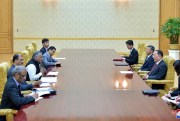 Members of an Indian delegation headed by junior Foreign Minister V. K. Singh, third left, meet North Korean Foreign Minister Ri Yong Ho, third right, Pyongyang, North Korea, May 16, 2018 (Korean Central News Agency/Korea News Service photo via AP).