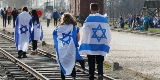 People take part in the annual “March of the Living” to commemorate the Holocaust, Oswiecim, Poland, April 12, 2018 (AP photo by Czarek Sokolowski).