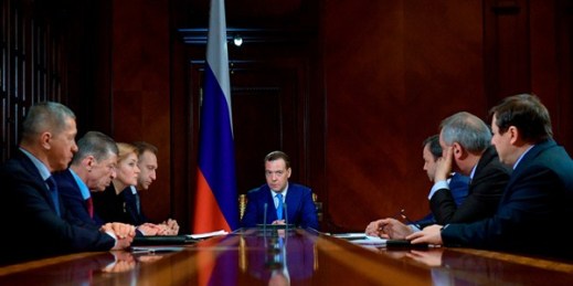 Prime Minister Dmitry Medvedev leads a Cabinet meeting to draw up measures to support sanctioned Russian companies, in the Gorky residence outside Moscow, April 9, 2018 (Sputnik photo by Alexander Astafyev via AP).