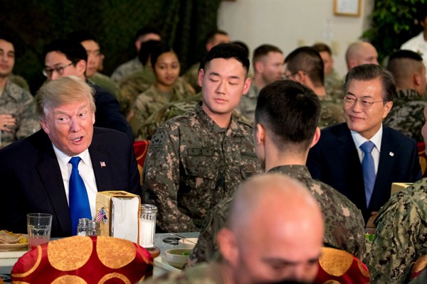 U.S. President Donald Trump and South Korean President Moon Jae-in have lunch with U.S. and South Korean troops at Camp Humphreys, Pyeongtaek, South Korea, Nov. 7, 2017 (AP photo by Andrew Harnik).