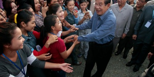 Cambodian Prime Minister Hun Sen greets garment workers on the outskirts of Phnom Penh, Cambodia, Aug. 23, 2017 (AP photo by Heng Sinith).