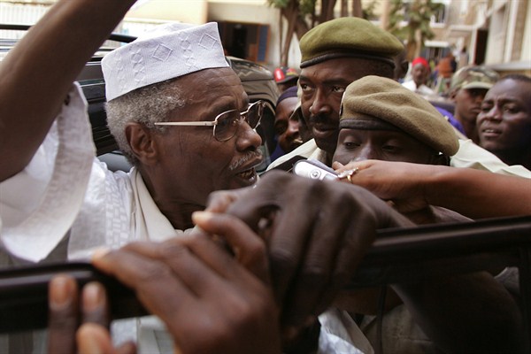 Former Chadian dictator Hissene Habre leaves a courthouse in Dakar, Senegal, Nov. 25, 2005 (AP photo by Schalk van Zuydam).