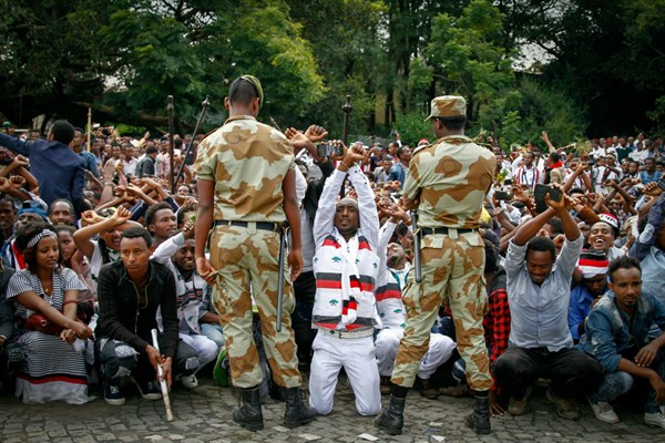 Ethiopian soldiers face protesters, Bishoftu, Ethiopia, Oct. 2, 2016 (AP photo).
