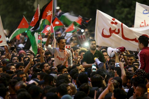 Protesters gather outside the prime minister’s office in Amman, Jordan, June 6, 2018 (AP photo by Raad al-Adayleh).