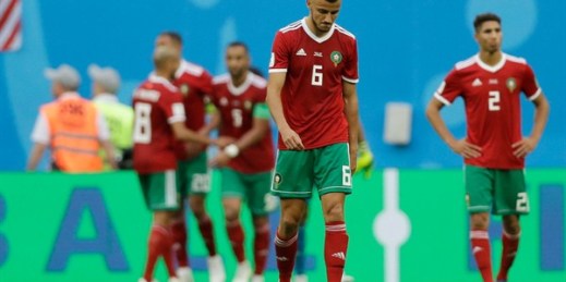 Morocco’s Romain Saiss reacts after his teammate Aziz Bouhaddouz scored an own goal during the team’s opening loss to Iran at the 2018 World Cup, St. Petersburg, Russia, June 15, 2018 (AP photo by Andrew Medichini).