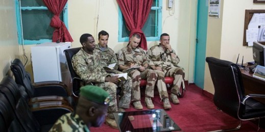 American and French soldiers attend a daily briefing with the Nigerien military commander in charge of the fight against Boko Haram at a Nigerien military base in Diffa, Niger, March 26, 2015 (photo by Joe Penney).