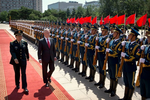 Chinese Defense Minister Wei Fenghe and U.S. Defense Secretary Jim Mattis review an honor guard during a welcome ceremony in Beijing, June 27, 2018 (AP photo by Mark Schiefelbein).