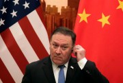 U.S. Secretary of State Mike Pompeo listens to a question from a reporter during a joint press conference with Chinese Foreign Minister Wang Yi at the Great Hall of the People, Beijing, June 14, 2018 (AP photo by Andy Wong).