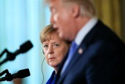 German Chancellor Angela Merkel listens to President Donald Trump talk during a news conference in the East Room of the White House, Washington, April 27, 2018 (AP photo by Manuel Balce Ceneta).