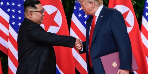 North Korea leader Kim Jong Un and U.S. President Donald Trump at the conclusion of their meetings at the Capella resort on Sentosa Island, Singapore, June 12, 2018 (AP photo by Susan Walsh).