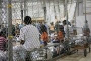 People taken into custody for illegal entry into the U.S. sit in one of the cages at a detention facility in McAllen, Texas, June 17, 2018 (U.S. Customs and Border Protection's Rio Grande Valley Sector photo via AP).