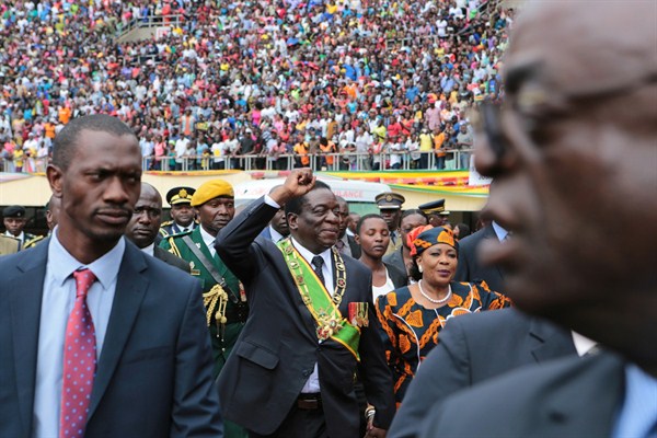 Zimbabwe’s president, Emmerson Mnangagwa, greets the crowd upon his arrival at the National Sports Stadium for celebrations marking the country’s independence anniversary, Harare, Zimbabwe, April 18, 2018 (AP photo by Tsvangirayi Mukwazhi).