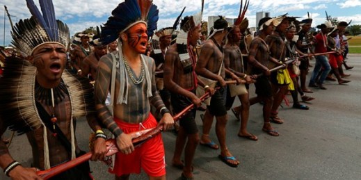 Indigenous Brazilians from various ethnic groups take part in a protest against the policies of President Michel Temer, Brasilia, Brazil, April 26, 2018 (AP photo by Eraldo Peres).