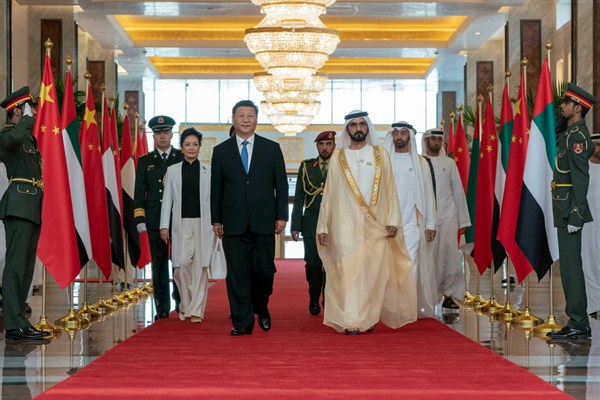 Chinese President Xi Jinping is received by Sheikh Mohammed bin Rashid Al Maktoum, vice president of the United Arab Emirates, after his arrival in Abu Dhabi, July 19, 2018 (Photo by Mohamed Al Hammadi for Emirates News Agency via AP Images).