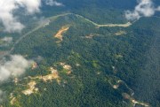 An aerial view of the rain forest, including the destruction caused by gold mining in Colombia, near the city of Quibdo, November 27, 2015 (Photo by Georg Ismar for DPA via AP Images).