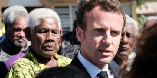 French President Emmanuel Macron is welcomed at the airport on Ouvea Island, New Caledonia, May 5, 2018 (AP photo by Theo Rouby).