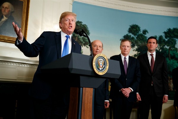 President Donald Trump speaks before signing a memorandum imposing tariffs and investment restrictions on China, Washington, March 22, 2018 (AP photo by Evan Vucci).