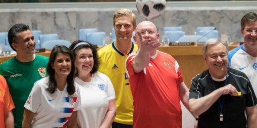 Ambassadors to the U.N. including Nikki Haley of the U.S. and Vassily Nebenzia of Russia and Secretary-General Antonio Guterres pose for a World Cup-themed photo, U.N. headquarters, New York, June 14, 2018 (AP photo by Mary Altaffer).