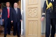 U.S. President Donald Trump and Russian President Vladimir Putin arrive for a one-on-one-meeting at the Presidential Palace in Helsinki, Finland, July 16, 2018 (AP photo by Pablo Martinez Monsivais).