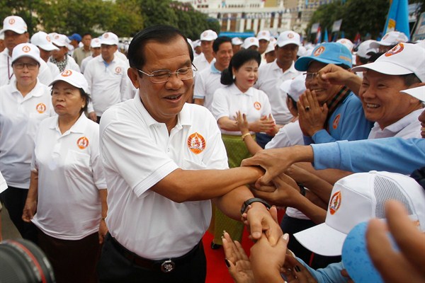 Cambodian Prime Minister Hun Sen greets supporters at a campaign event, Phnom Penh, July 7, 2018 (AP photo by Heng Sinith). 