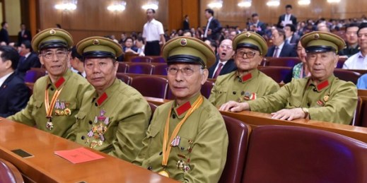 Chinese veterans attend a grand rally to mark the 90th founding anniversary of the People's Liberation Army at the Great Hall of the People in Beijing, China, Aug. 1, 2017 (Photo by Ke Wei for Imaginechina via AP Images).
