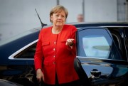 German Chancellor Angela Merkel arrives at the Reichstag building for a meeting of the CDU, CSU and SPD parties, Berlin, Germany, July 5, 2018 (AP photo by Kay Nietfeld).